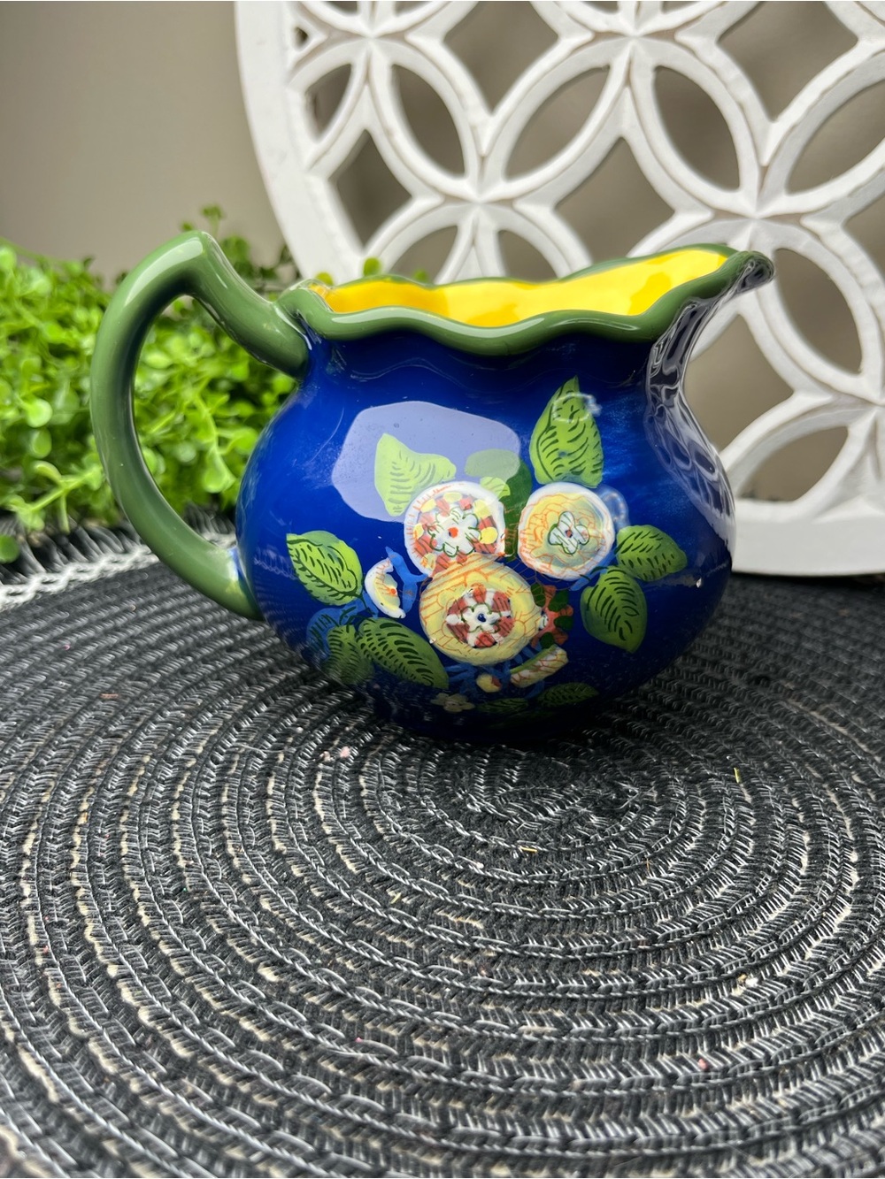April Cornell Blue Floral Ceramic Pitcher with Yellow Interior and Green Handle